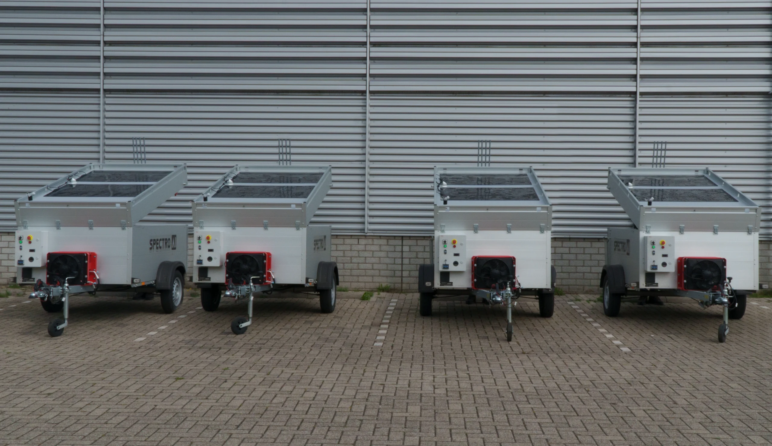 A row of four Dockwatch trailers